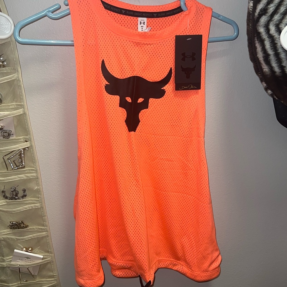NWT the rock underarmor shirt. Netted material